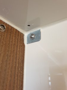 Toilet left upper corner by the door.jpg